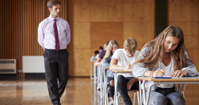 Students taking an exam with AI