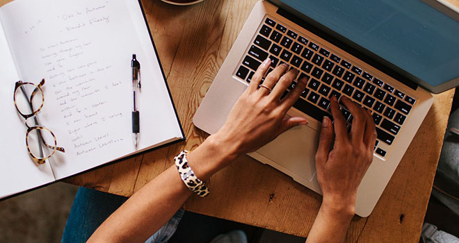 Business writing on laptop